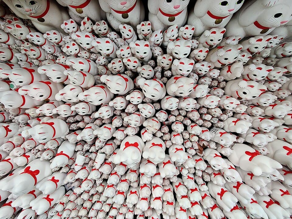 Maneki-neko statues at Gotokuji Temple in Tokyo